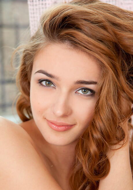 Slim redheaded teen Adriana F in foot fetish show 